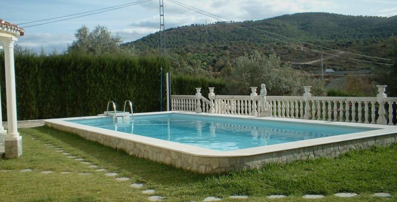 Finca pool for sale in Coín